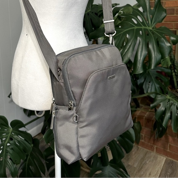 Travelon Handbags - 💥Unisex NEW. TRAVELON mini bag it’s small but carry lots of stuff!! Plenty room